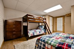 Lower level bunk room with 1 full and 1 bunk bed