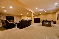 Downstairs living area image 1 with ping pong table