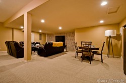 Downstairs living area image 2 with poker table