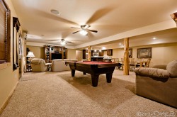 Downstairs living area with pool table image 1