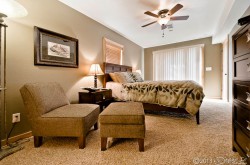 Downstairs bedroom with queen bed and private bath