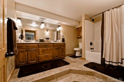 Downstairs full bath with dual sinks