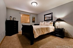 Downstairs bedroom 3 with queen bed